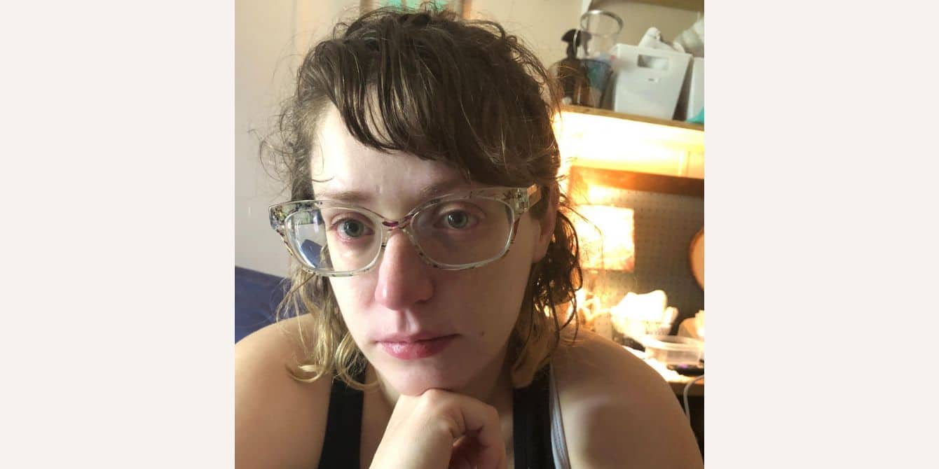 Brittney on getting help and support for prenatal and postpartum depression selfie of a crying woman - essay on prenatal and postpartum depression