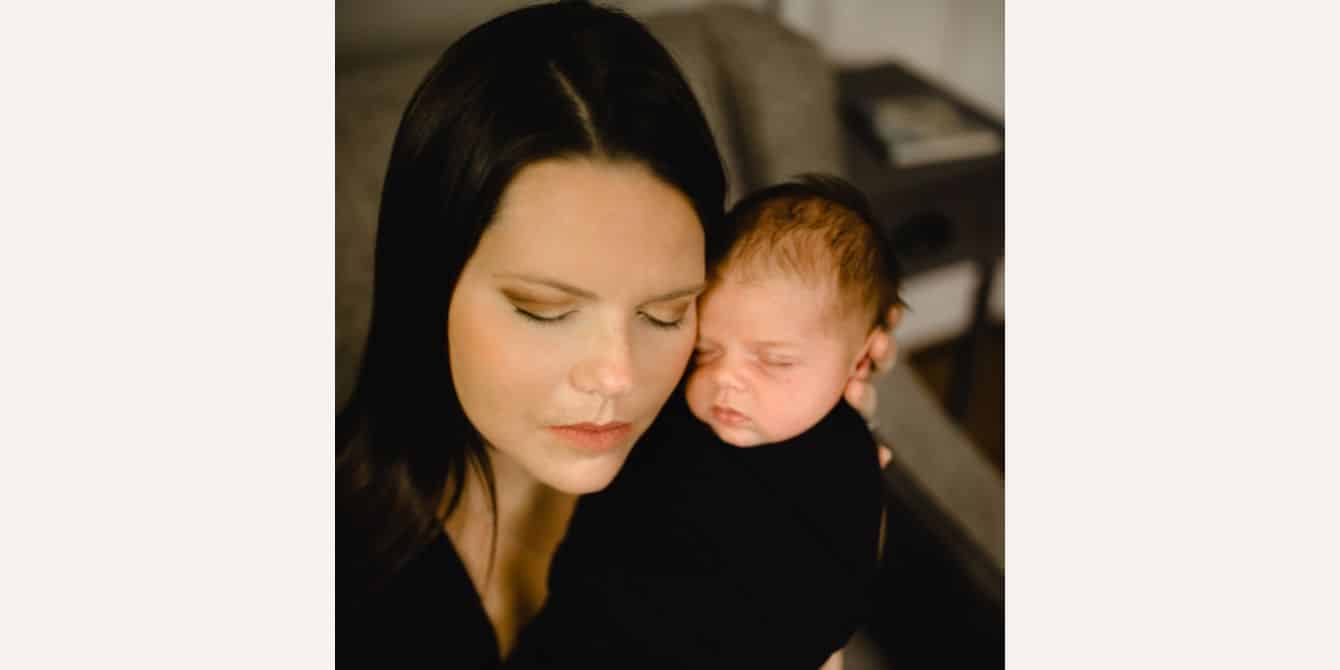 Candice on getting help for postpartum psychosis newborn photos of mom with a swaddled baby - essay on getting help for postpartum psychosis
