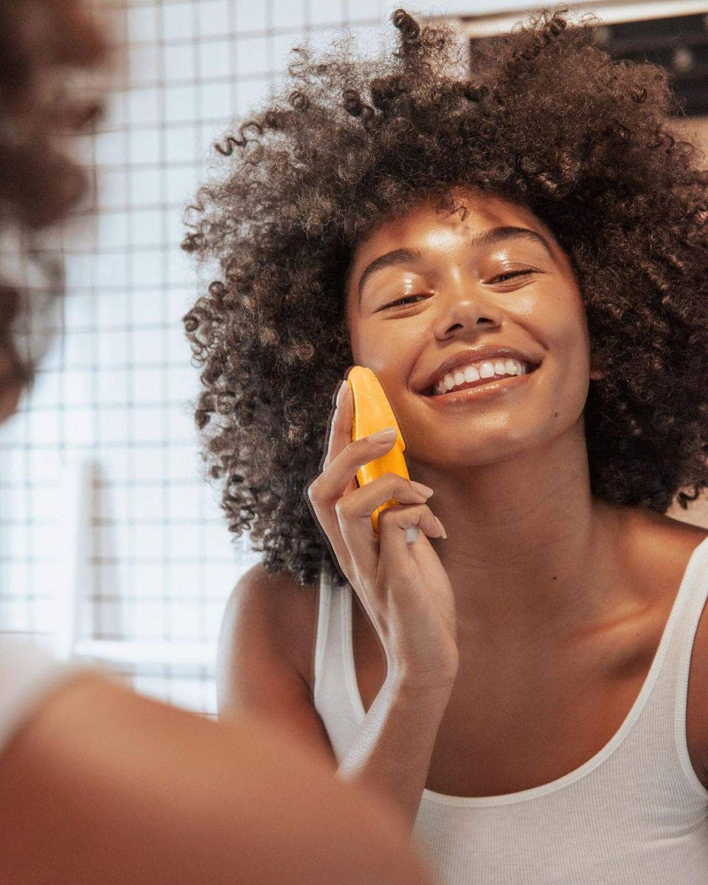 11 beauty products that keep you feeling fresh even when you can’t shower woman scrubbing face