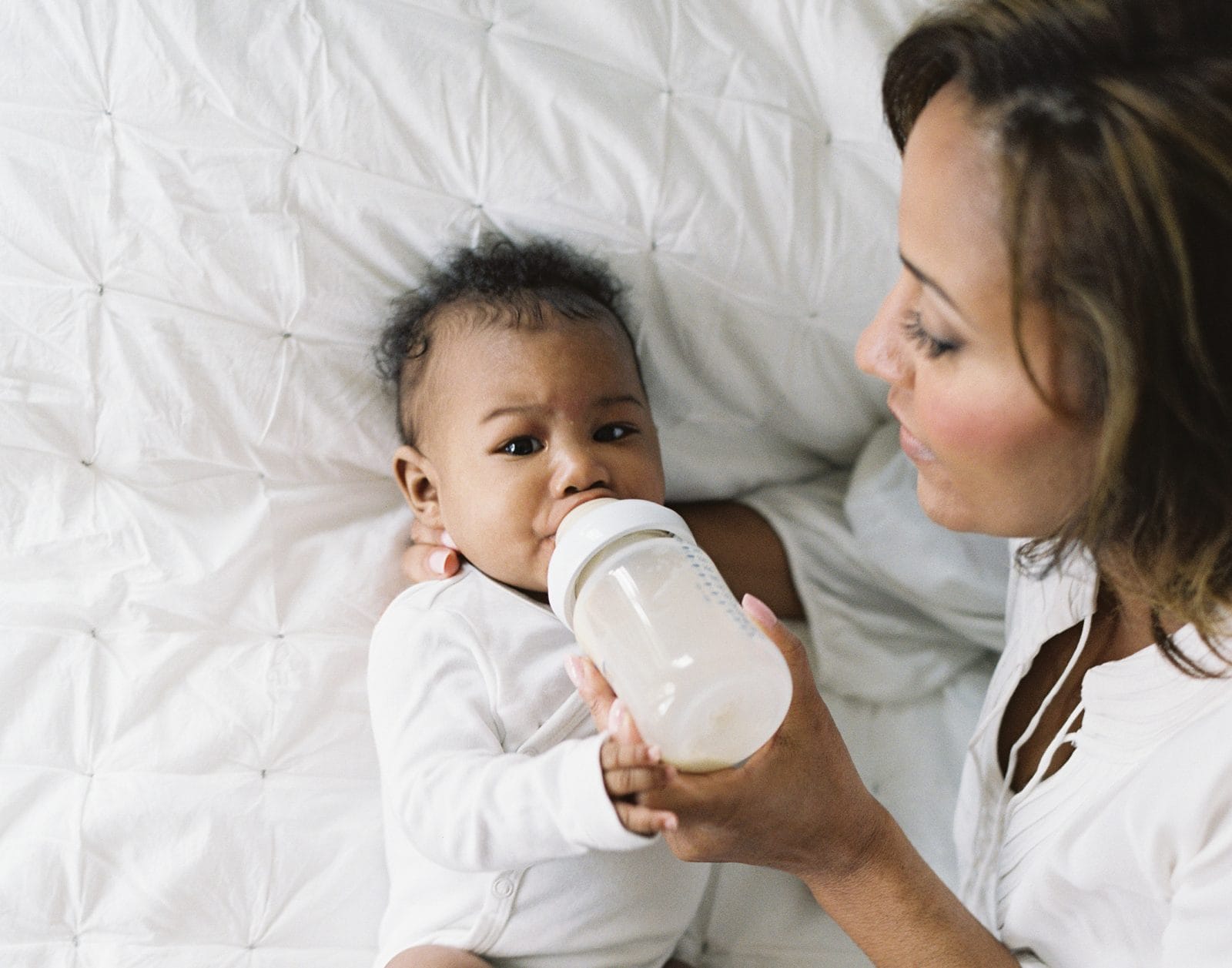 Ask Motherly: How do you help a breastfeeding baby take a bottle?
