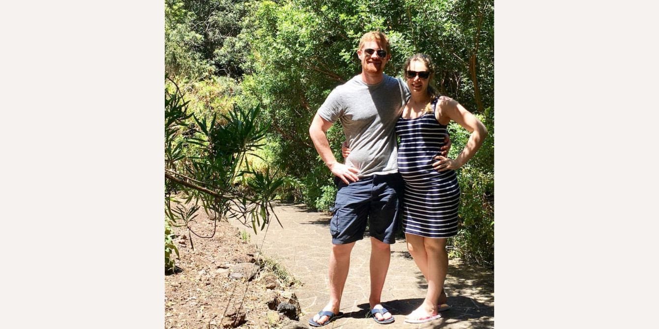 Eloise on getting help for postpartum OCD and intrusive thoughts pregnant woman and partner on a hike - essay about postpartum OCD