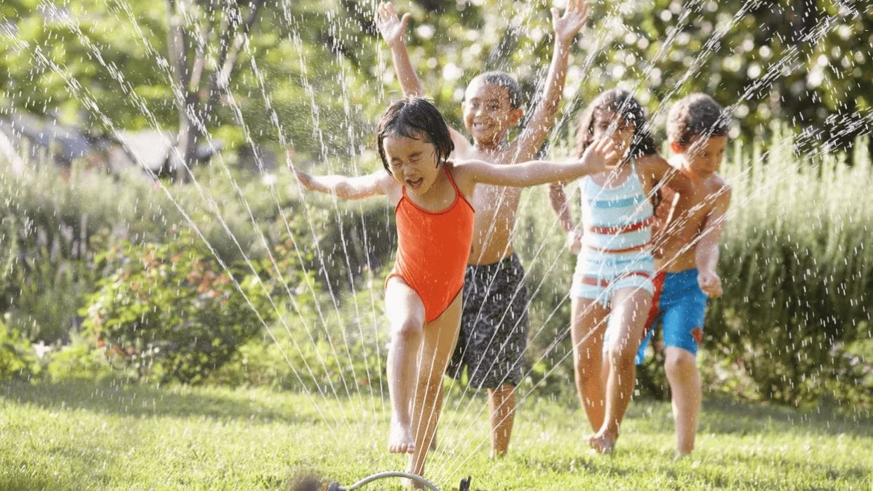 Experts say these will be the must-have toys for summer kids playing in a sprinkler