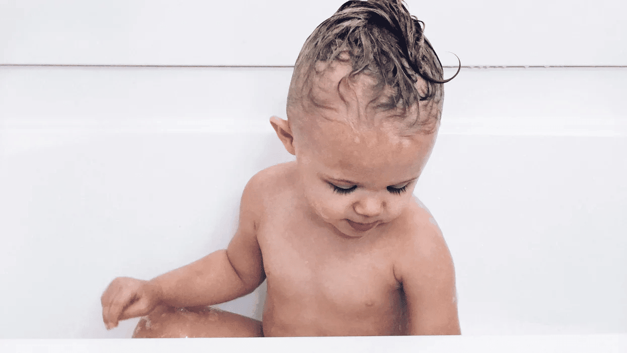 This baby bath seat is being recalled over drowning concerns 🚨 baby boy in a bath