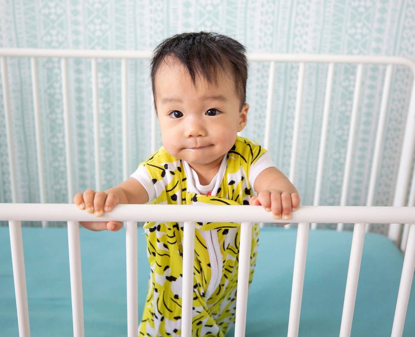 The 9 best sleep sacks for toddlers who always kick their blankets off toddler-in-crib-wearing-toddler-sleep-sack