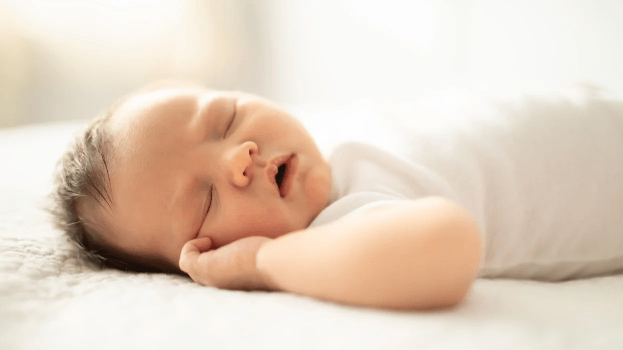 Sharing a bed with your baby doesn’t boost ‘attachment,’ study says baby sleeping on its back