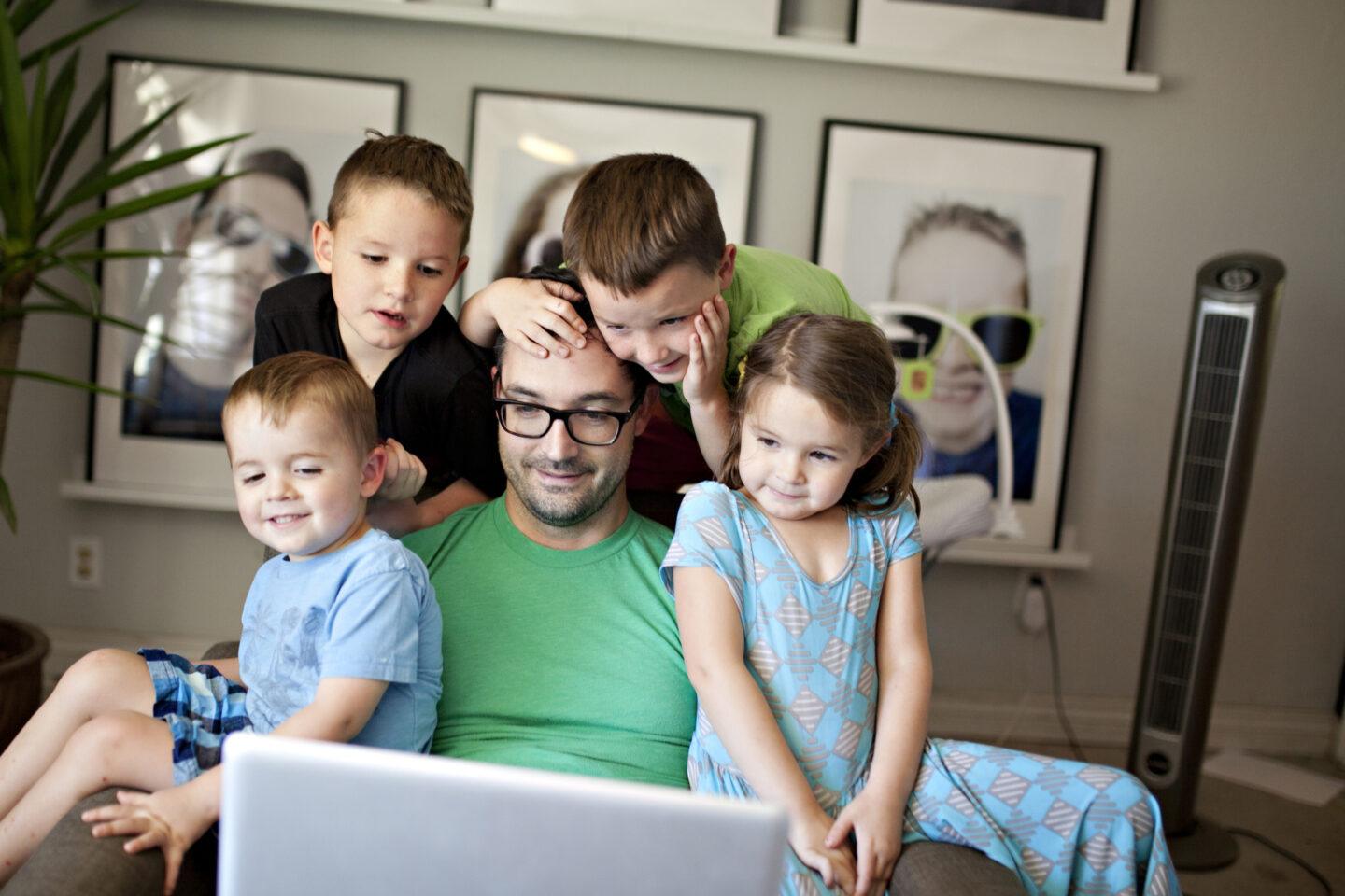 Dear husband, you’re working hard, too–I see you dad working with kids surrounding him