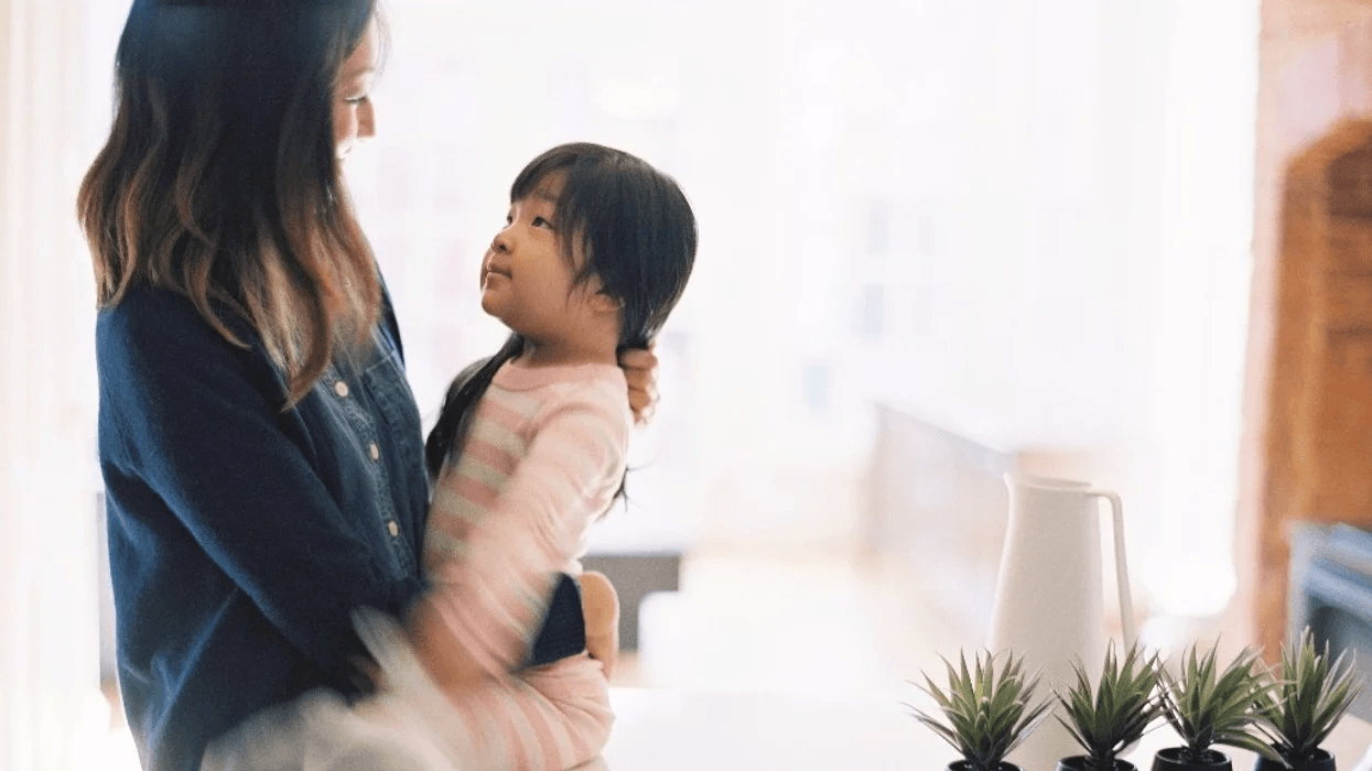 The one thing to always say when disciplining your child mom holding little girl