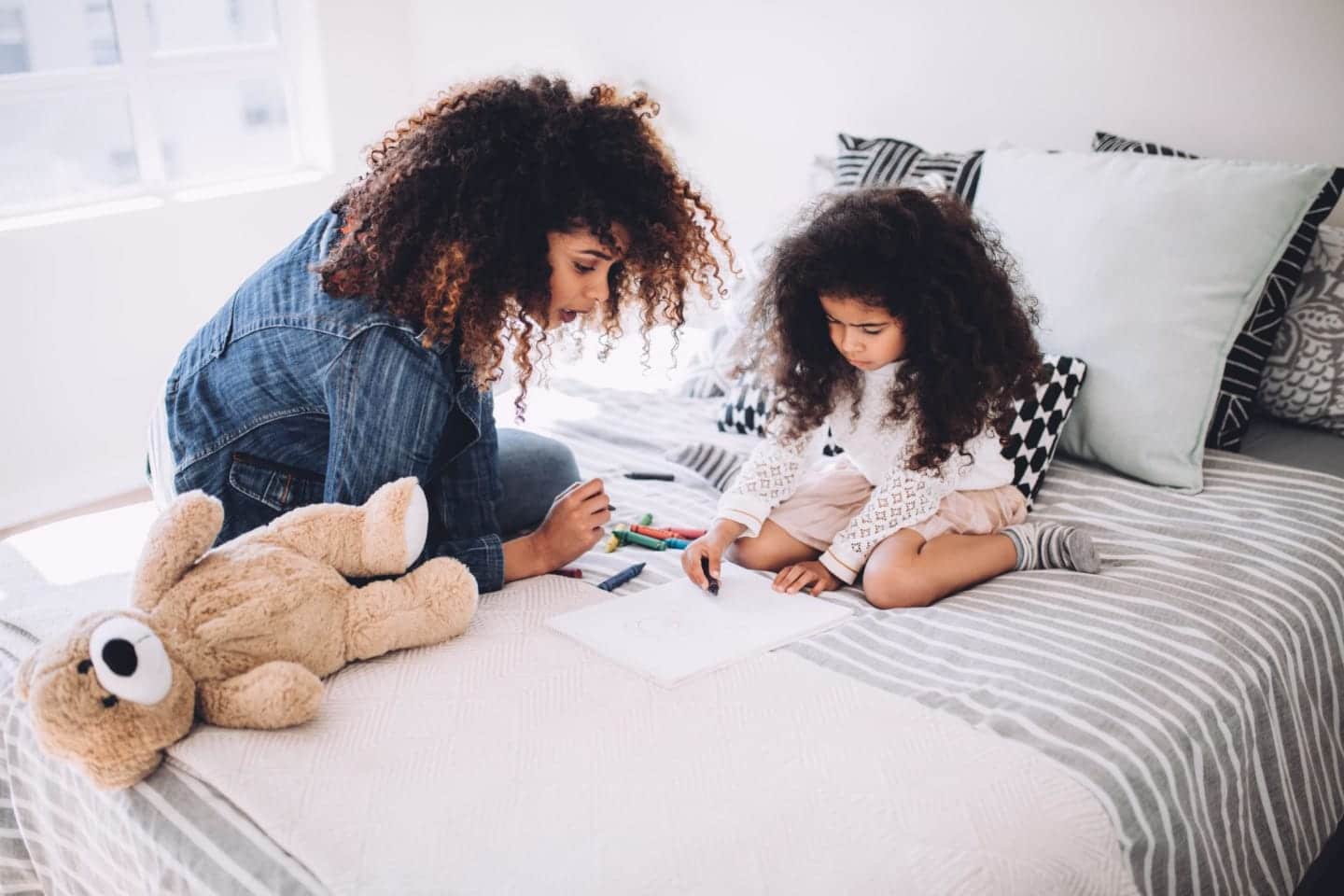 Are you a momaholic? Here are 8 signs you need more time for you mom and child drawing on the bed- mom burnout