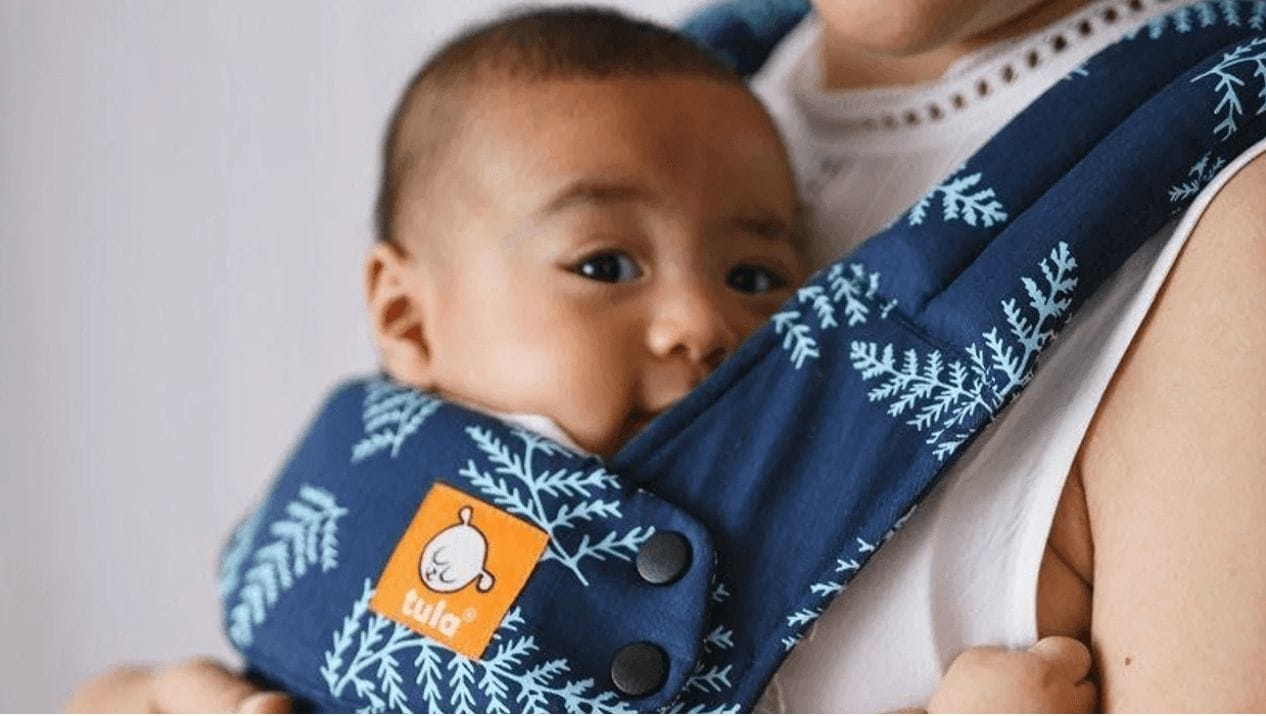 These are the 5 best carriers–according to a babywearing expert mom wearing a baby in a Tula carrier