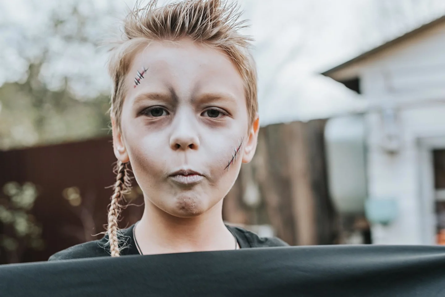 12 Halloween makeup ideas for kids that are easier than you’d think boy wearing easy halloween make up