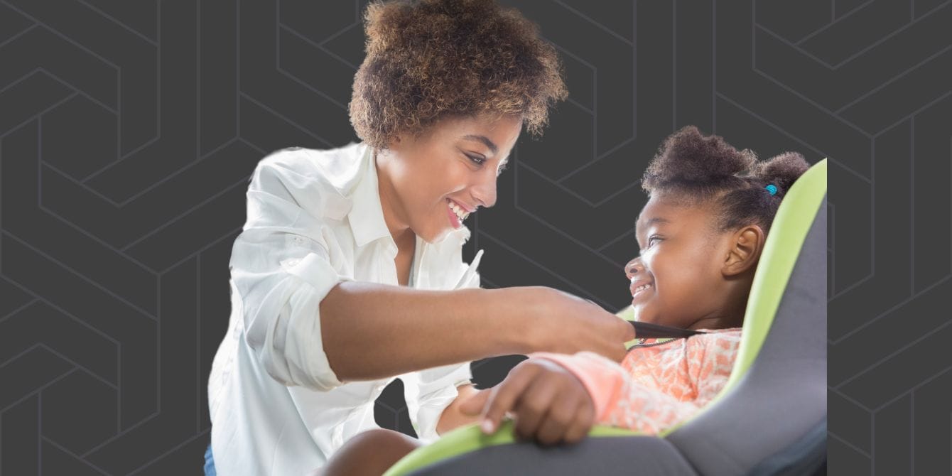 Target’s car seat trade-in is back! Here’s how to get your 20% off coupon Mom buckling toddler into car seat
