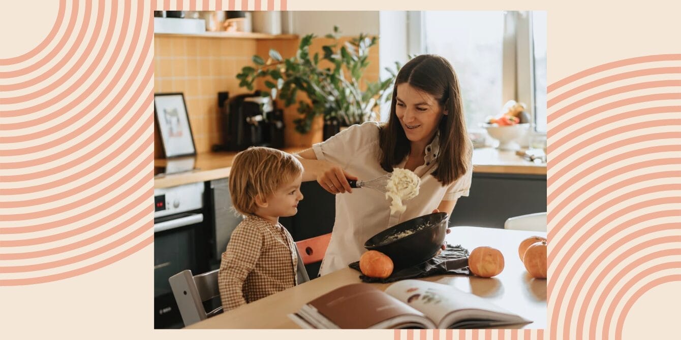mom and child making halloween dinner ideas - Motherly