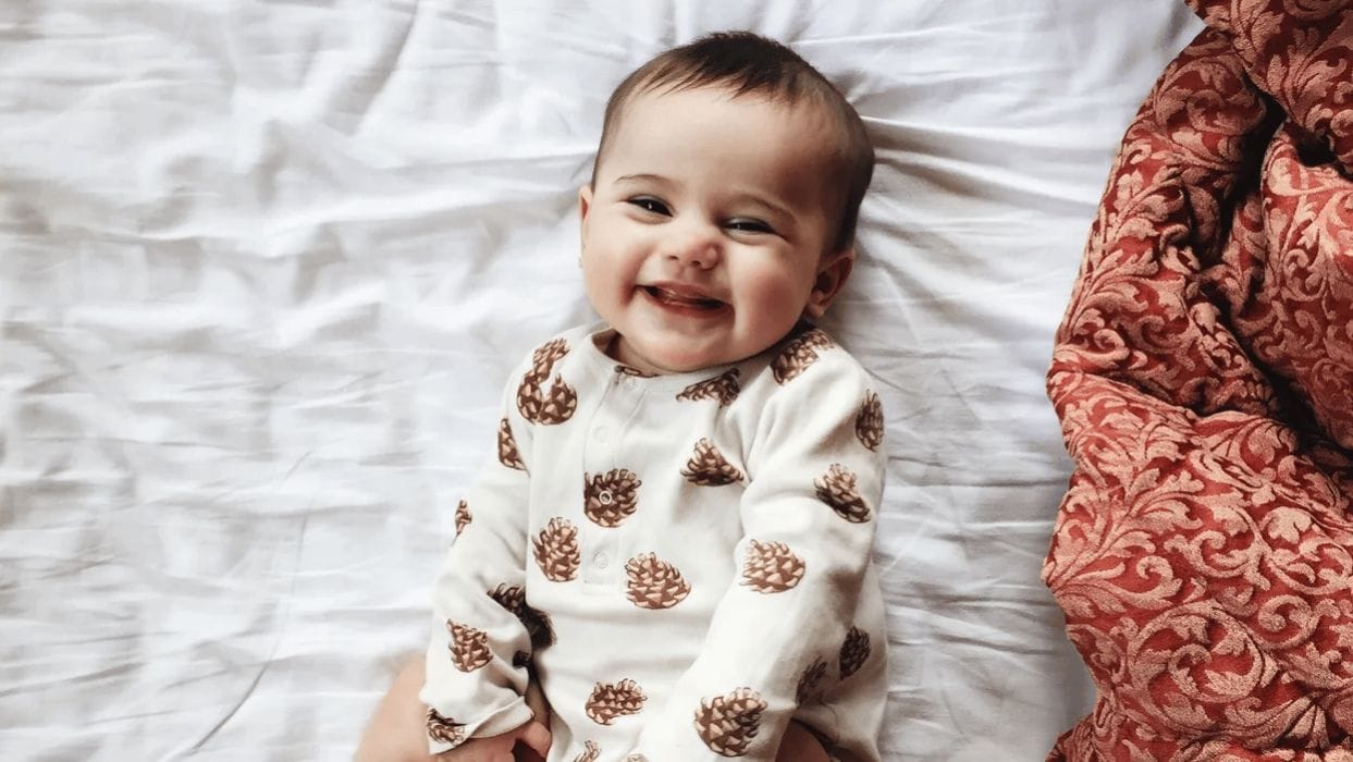 20 unique name ideas for your November baby baby smiling- november baby names