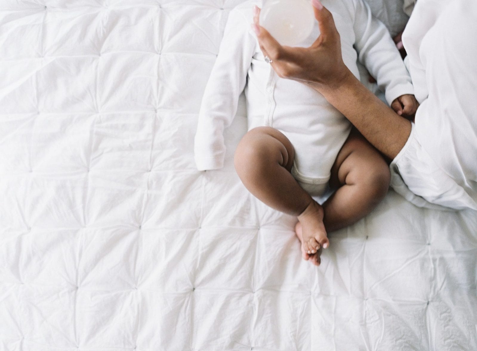 How long will it take you to get pregnant? mom giving baby a bottle