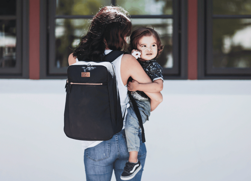 What baby items are really worth splurging on? mom carrying toddler
