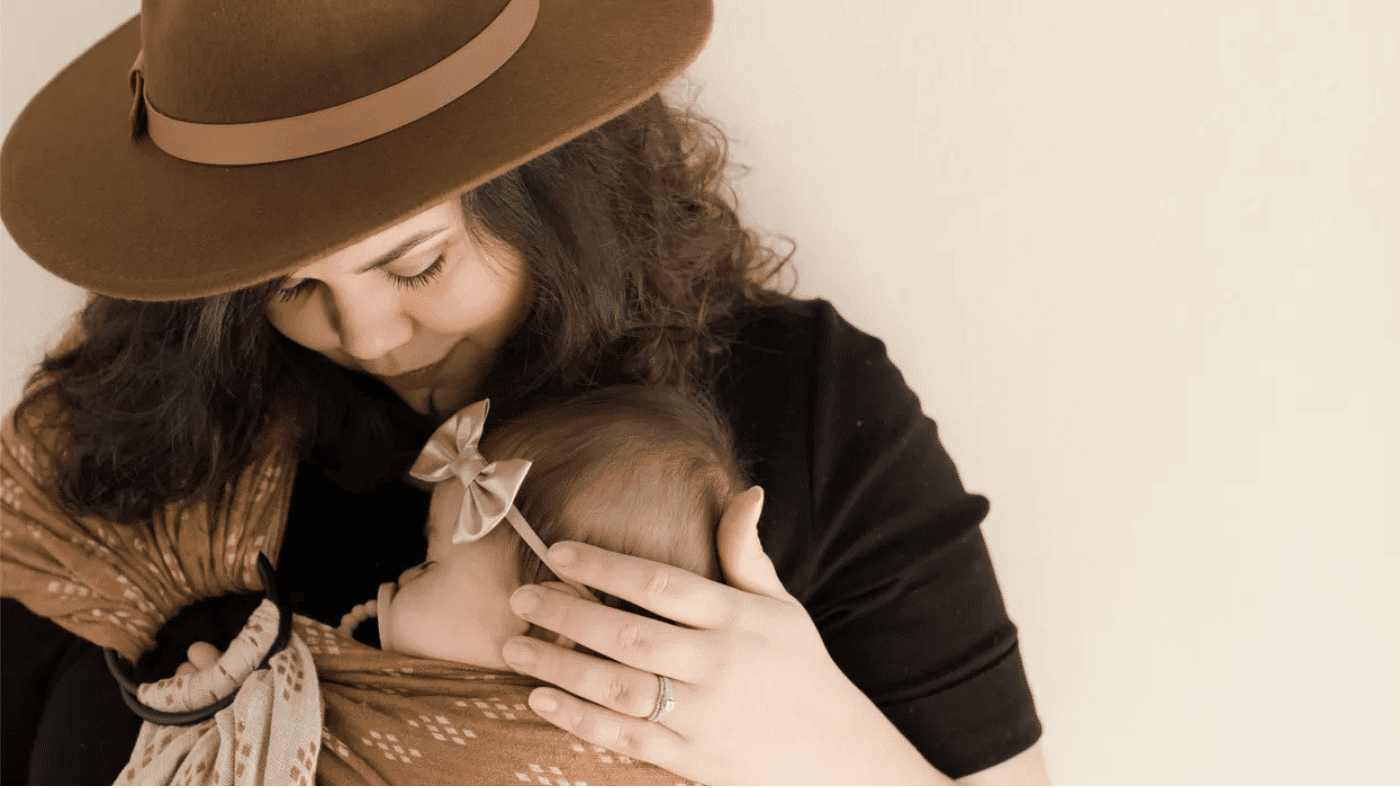 This mom’s viral tweet shows what *really* happens to your time after you have a baby mom holding newborn baby on her chest