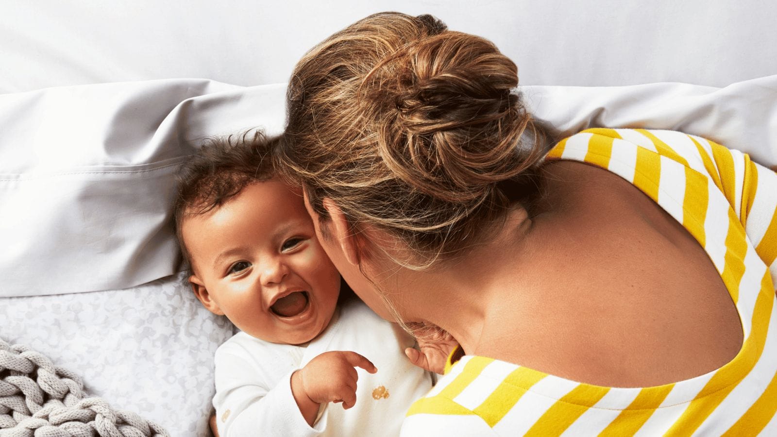 I tried it: Why doing my baby registry in person was the best decision I made mom kissing happy baby