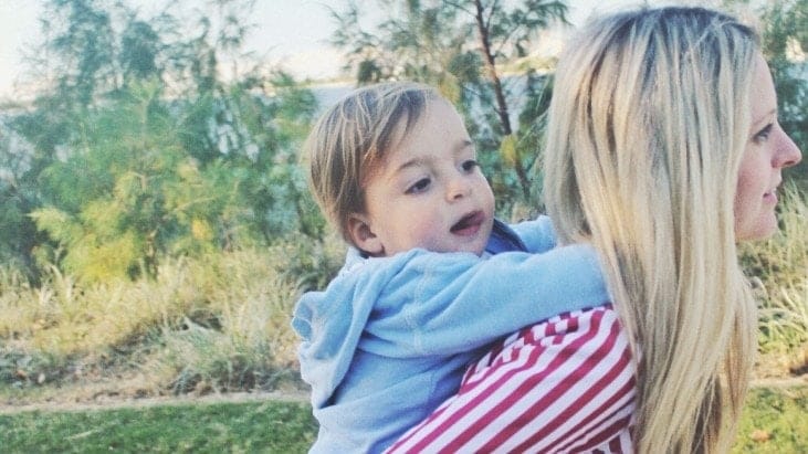 A letter to my sisters—thanks for making me an aunt woman carrying toddler on her back