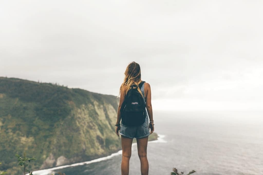 18 inspired ways to reconnect with your identity outside of motherhood woman hiking alone - reconnect with your identity