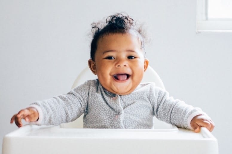 7 simple habits that create a lifetime of healthy eating little boy in a high chair