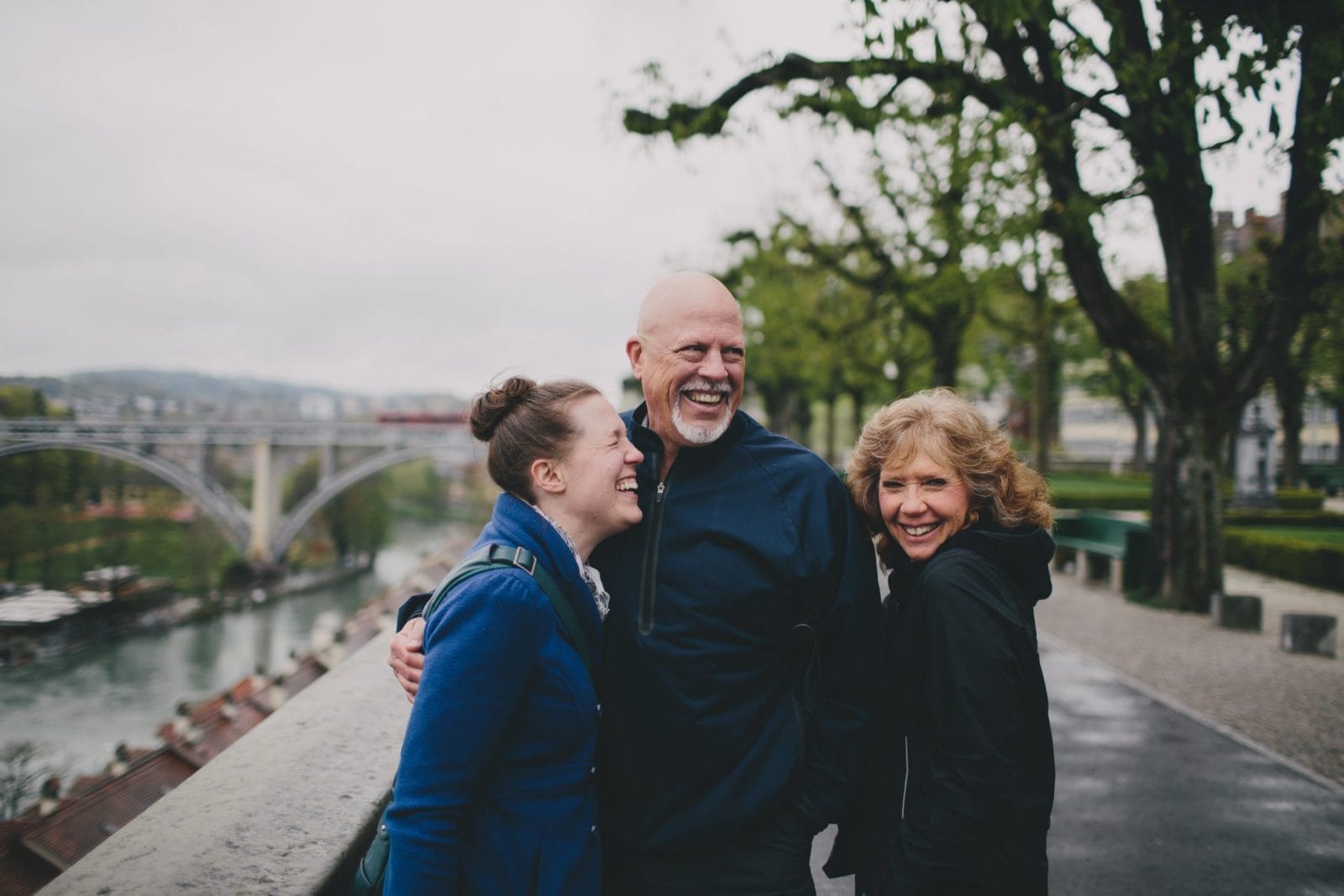 The love and responsibility of caregiving for parents caregiving for parents: daughter stands with older parents outside