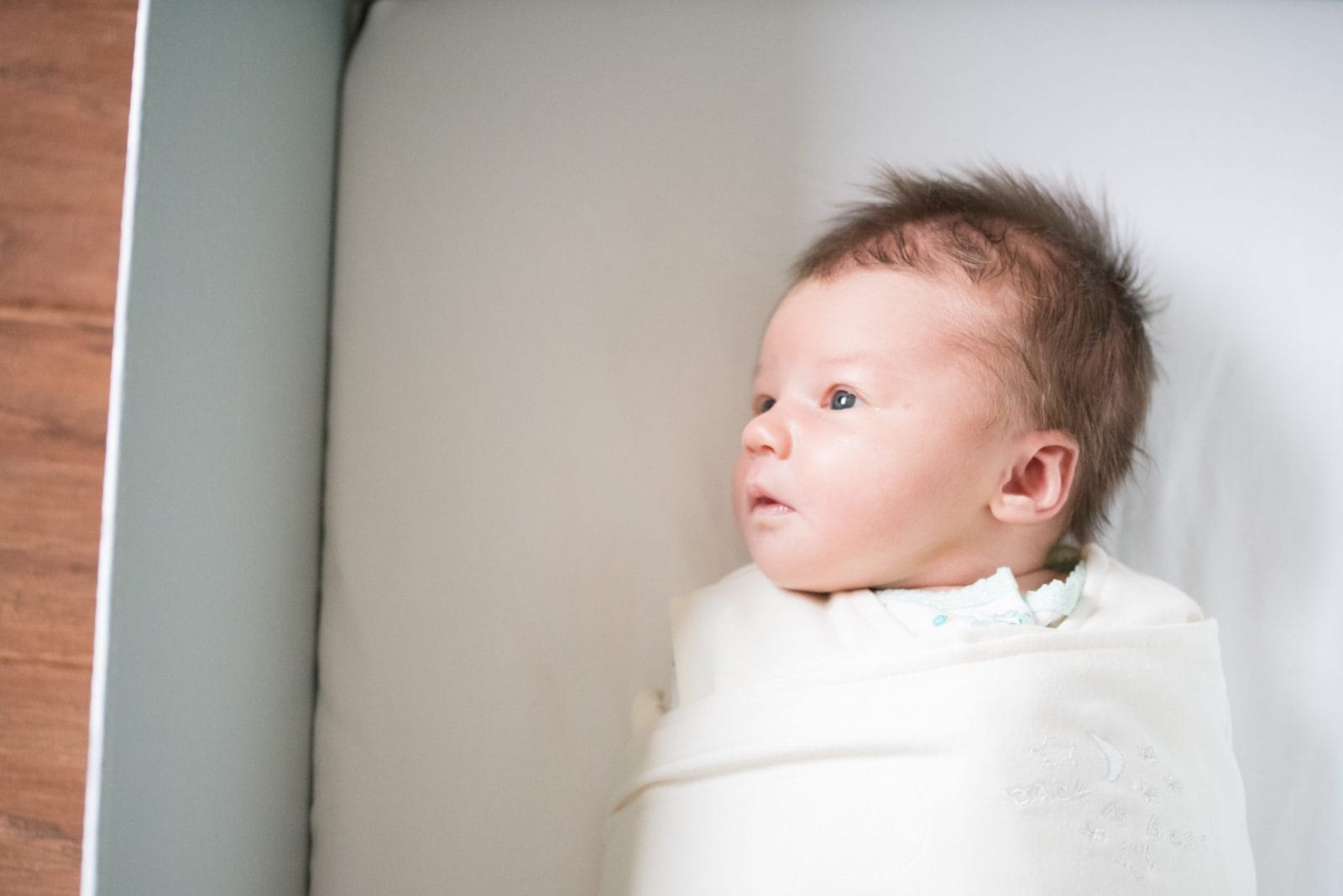 5 European approaches to raising babies we need to adopt ASAP swaddled baby in a bassinet