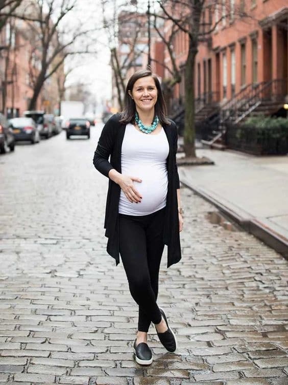 Emily Rasekh’s Pregnancy Style Pregnant woman walking outside