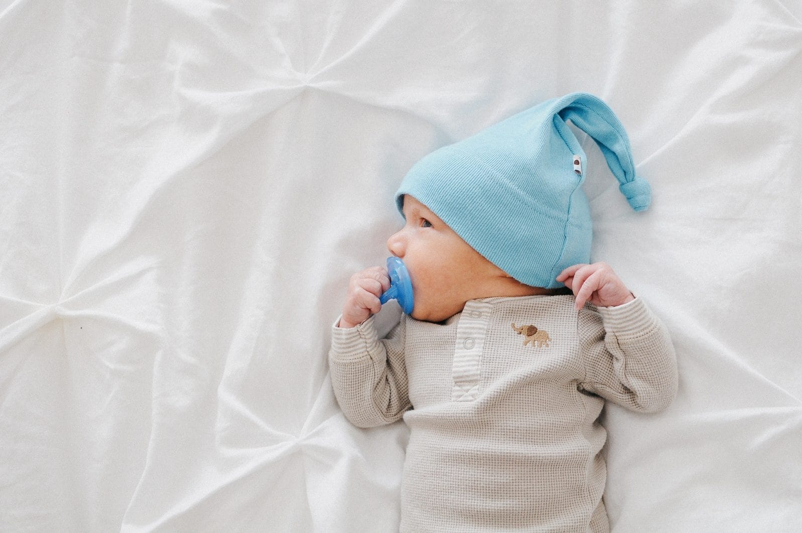 The biggest baby name trends of the last decade newborn baby boy laying in a crib