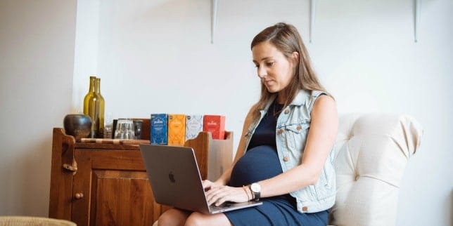 What’s Trump’s Family Leave Plan all about? pregnant woman working on laptop