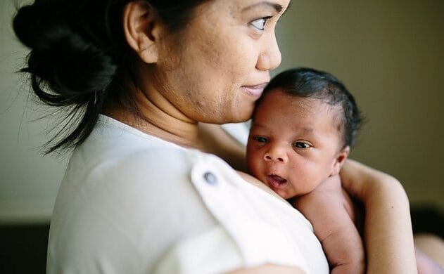 Dear dads: Take the picture mom holding newborn baby