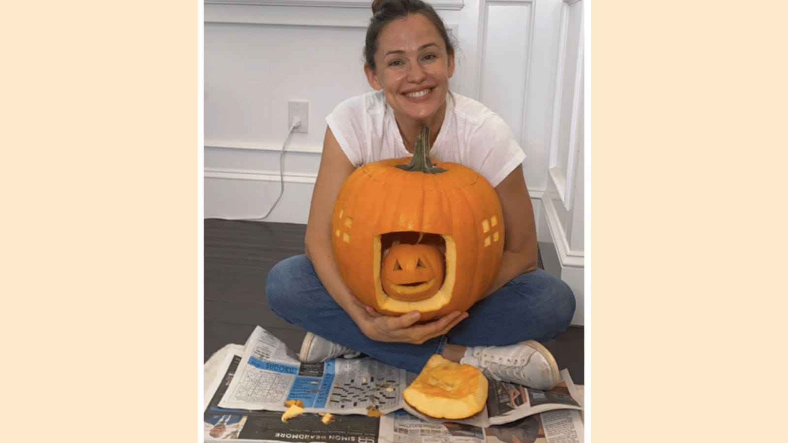 Jennifer Garner’s pumpkin pic has people thinking she’s pregnant at 48 Jennifer Garner with a big pumpkin in front of her