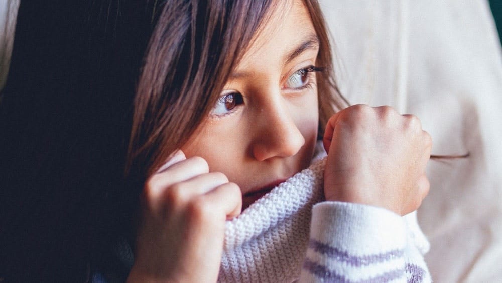 Remember: Your child is human too child playing with her turtleneck