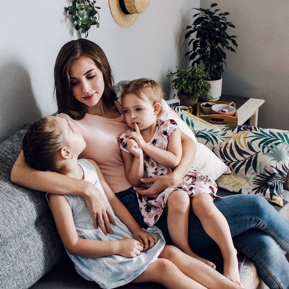 The ‘discipline’ approach that *prevents* kid problems mom hugging two kids