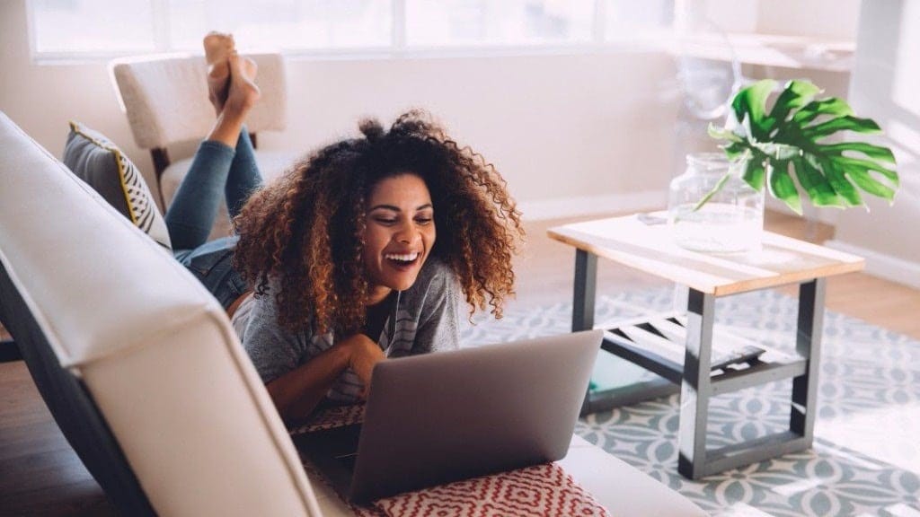 Yes I’m a wife and a mom, but I’m also still me woman laughing at computer - wife mommy me