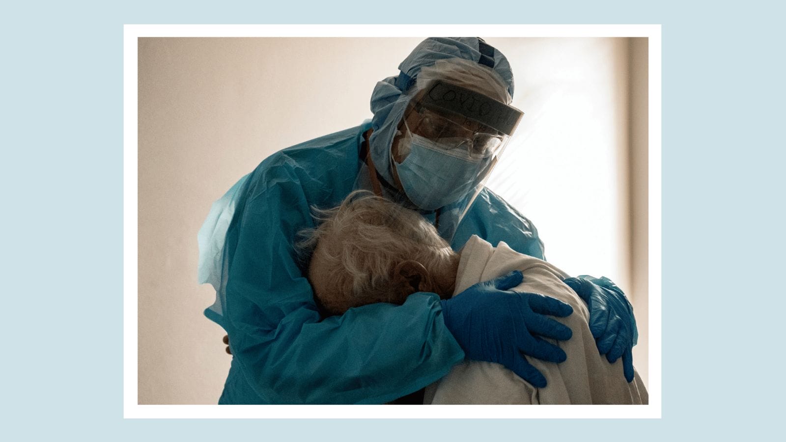 Doctor comforting elderly patient in viral photo speaks out