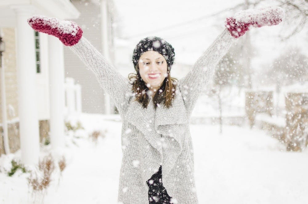 happy woman in the snow
