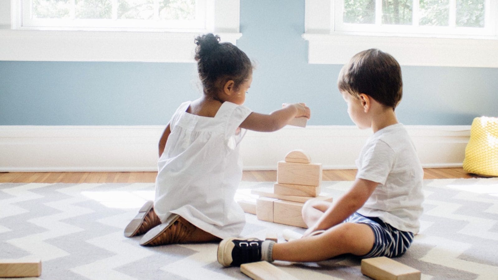 Montessori at home: 7 ways to teach your children to be problem-solvers kids playing with wooden block