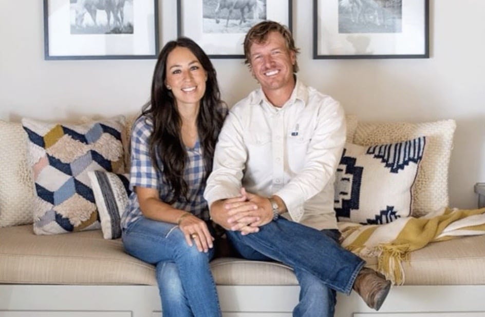 Chip Gaines’ advice for working parents will put your heart at ease couple sitting on the couch