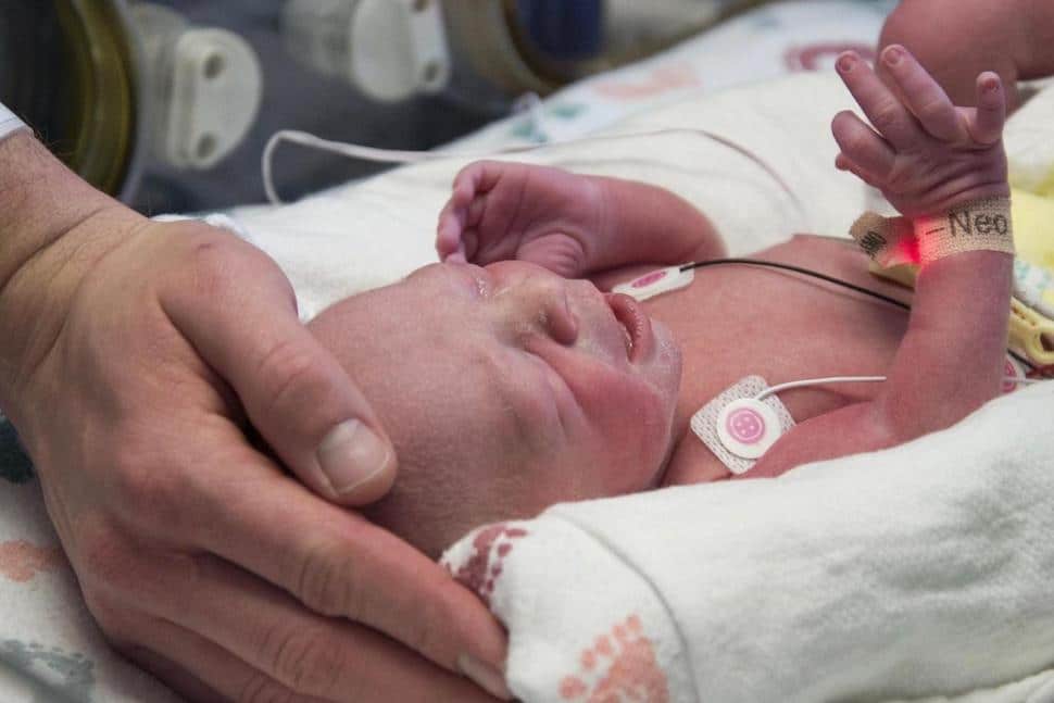 A woman born without a uterus just gave birth uterus transplant birth: newborn baby in hospital