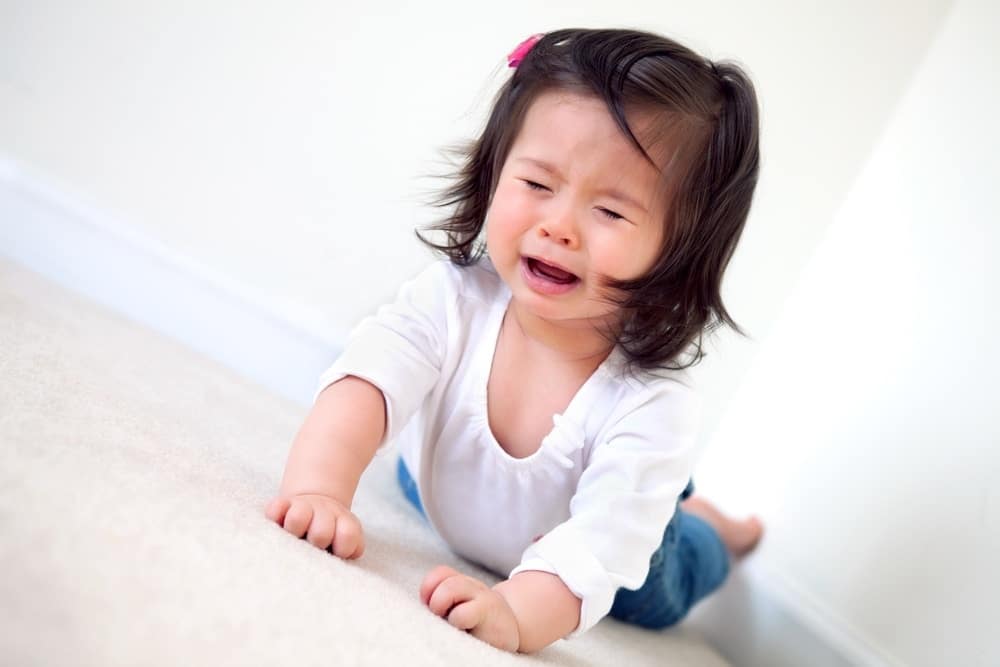 8 eye-opening lessons we learned about tantrums from experts toddler girl crying while laying on floor