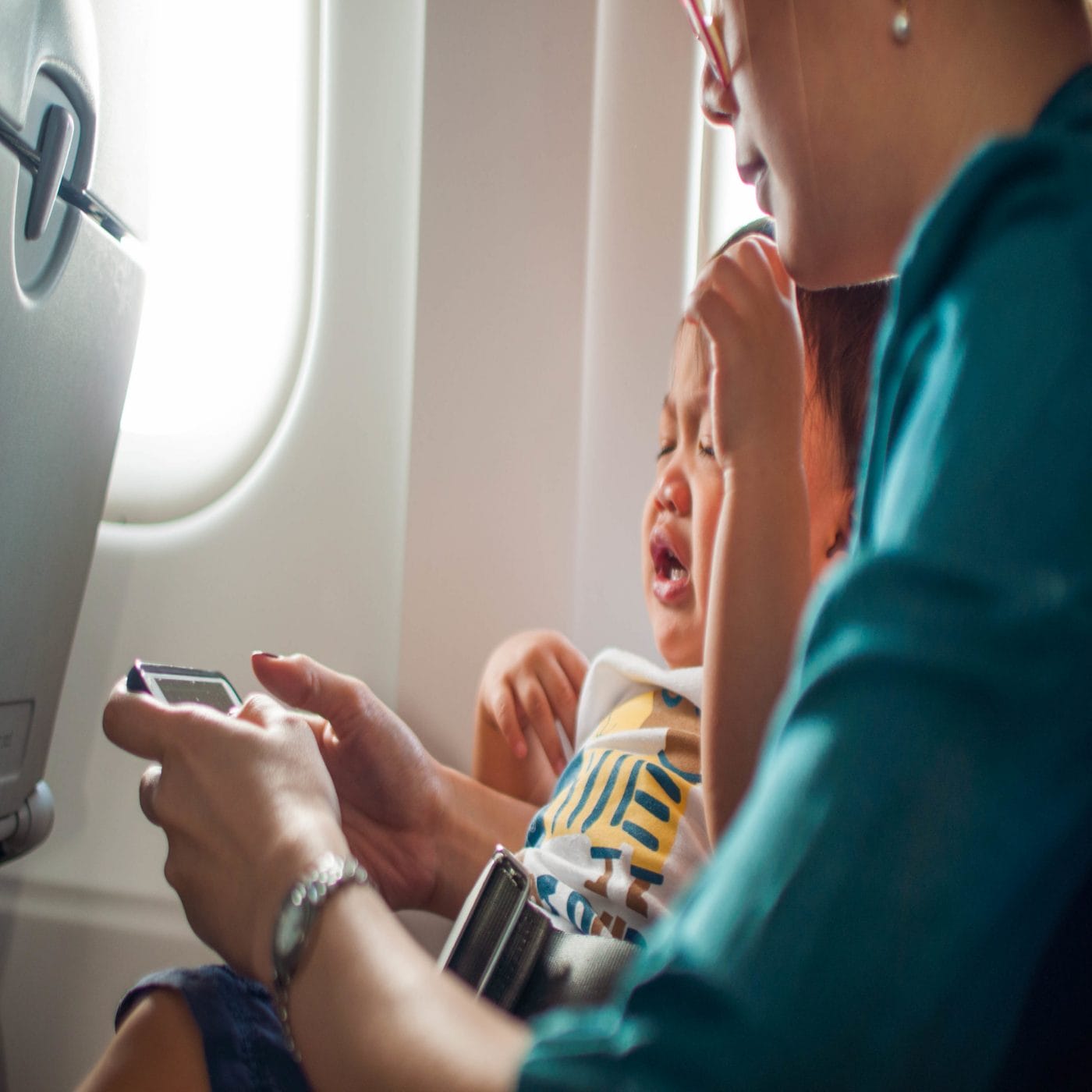 I stopped judging parents on planes after I became a mom