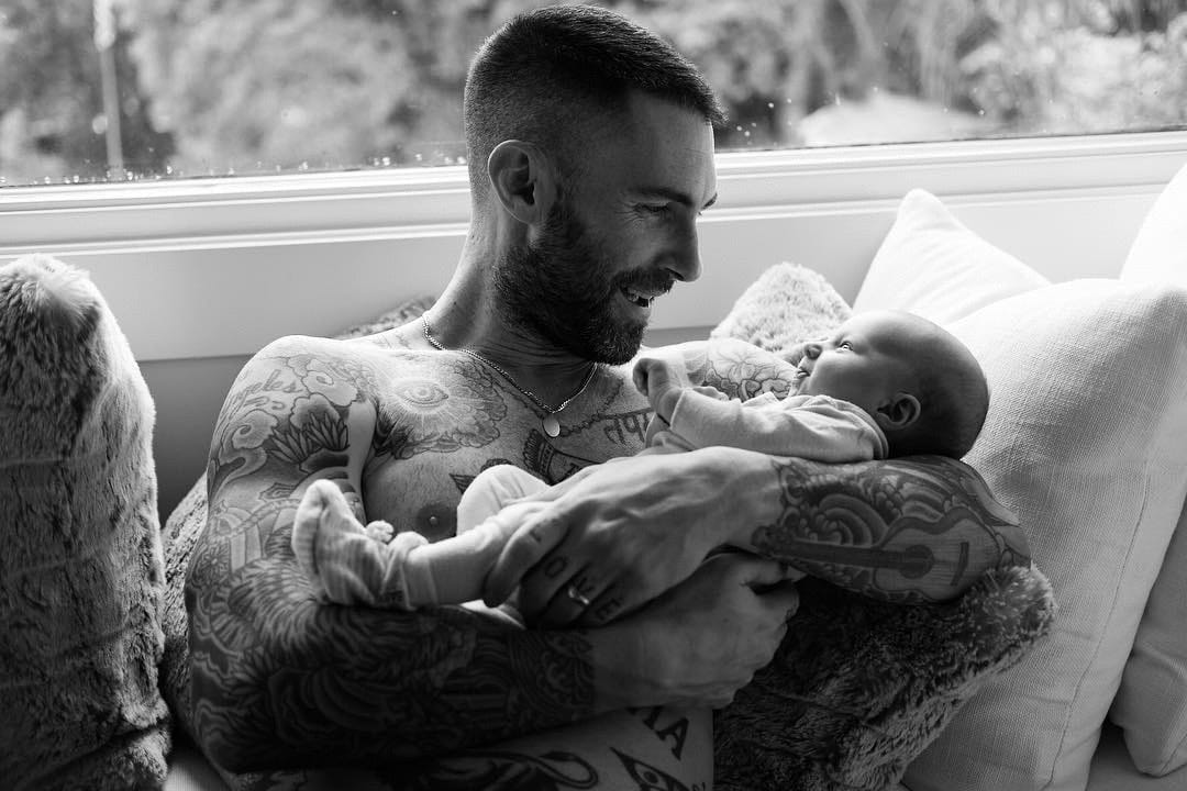 Adam Levine is happy just being a SAHD right now Adam Levine holding his baby