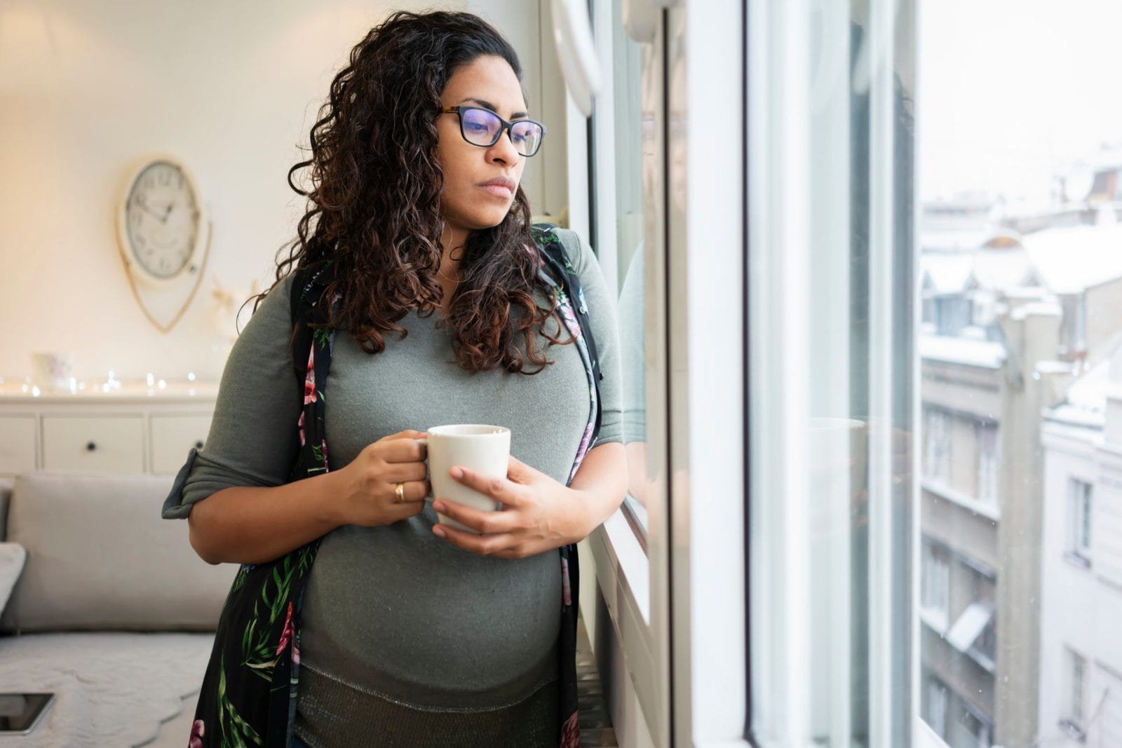 The one question that makes me feel like I’m failing as a working mom woman with a coffee cup
