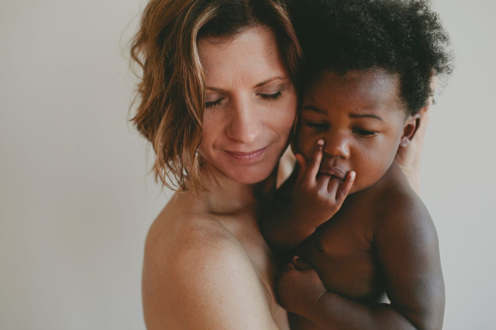How I adopted my son—and fought to become his mama mom holding son