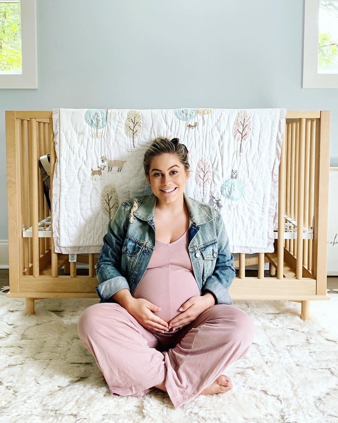 Shawn Johnson East felt ‘like a failure’ when she had to have a C-section pregnant Shawn Johnson East sitting in front of a crib