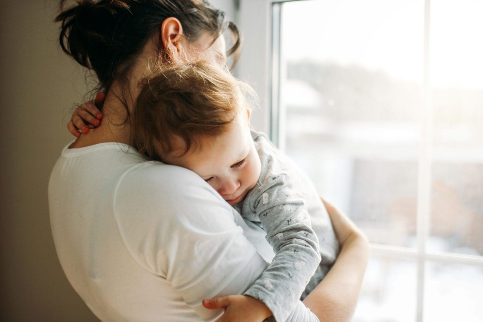 A love note to the exhausted single mama single mom holding baby against her shoulder