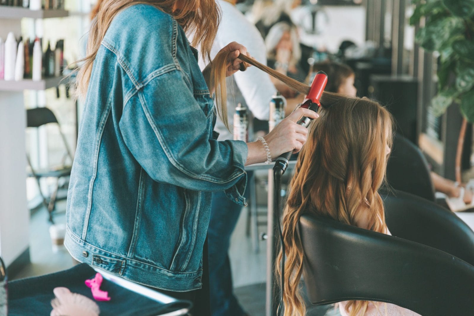 8 stylist-backed tips to keep your hair healthy + frizz-free this winter