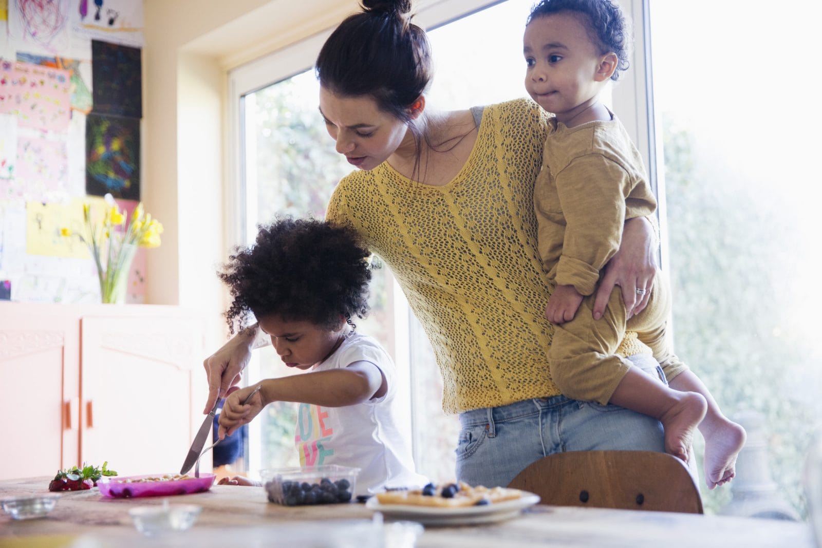 It’s okay if two kids is way harder than you thought mom holding two kids