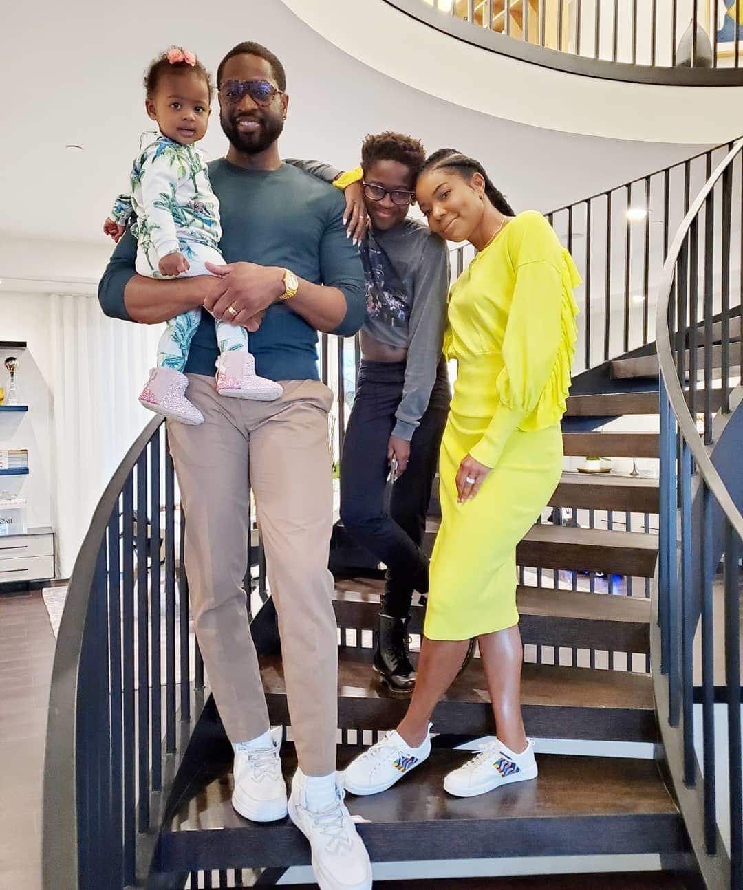 Dwyane Wade says his daughter knew she was trans at 3 years old Dwyane Wade family photo on the stairs