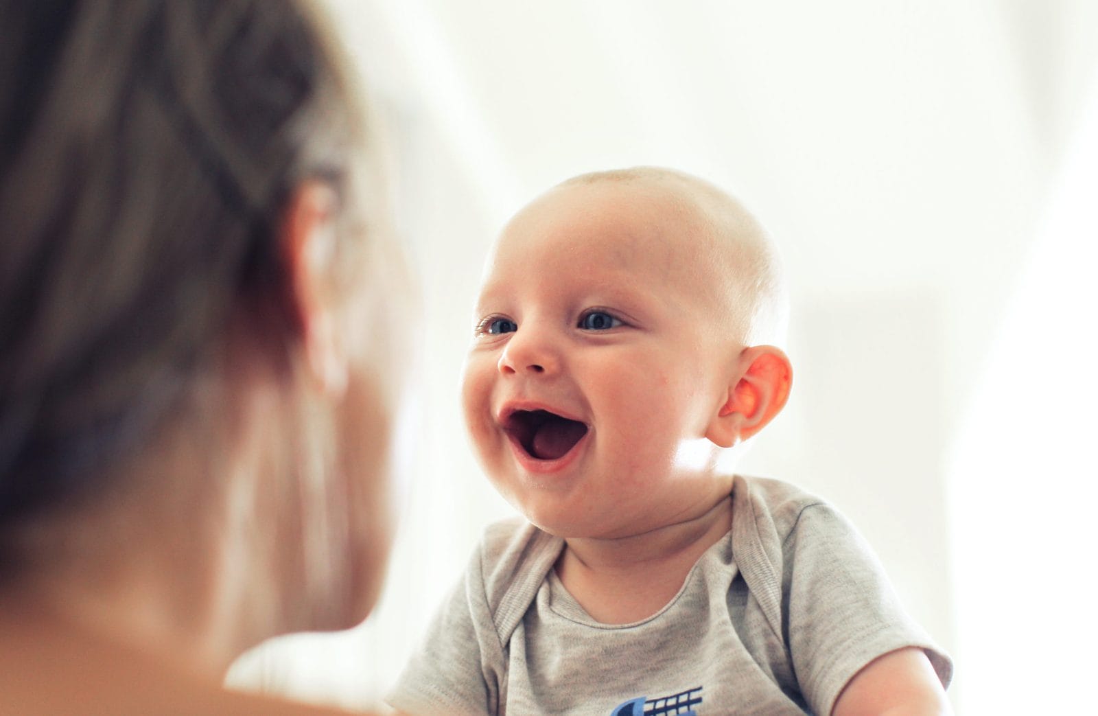 What happens to a mom’s brain when their baby smiles for the first time